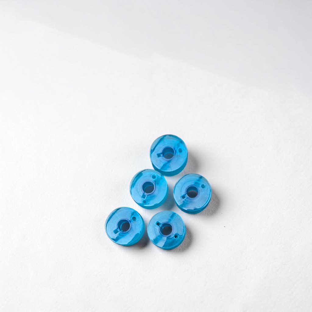 QUEED MULTI COLOUR  PLASTIC SEWING MACHINE BOBBIN