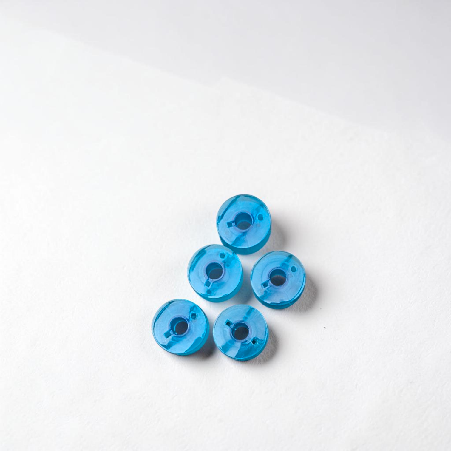QUEED MULTI COLOUR  PLASTIC SEWING MACHINE BOBBIN