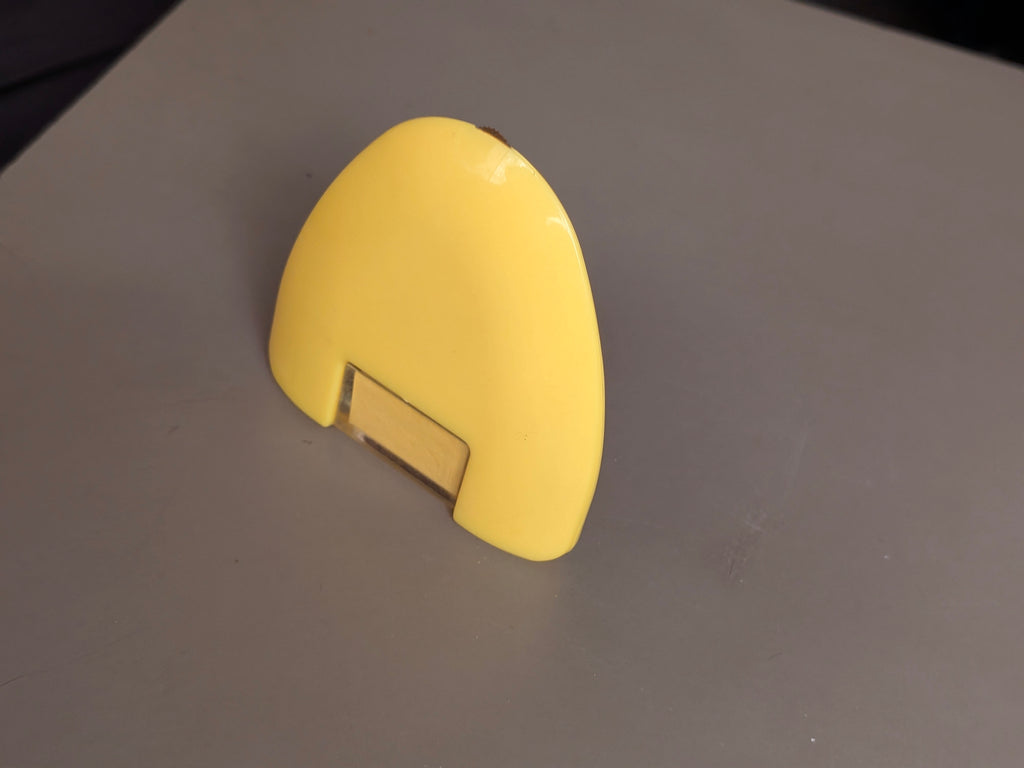 yellow wheel triangular chalk