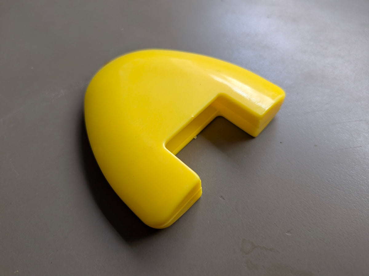 yellow wheel triangular chalk