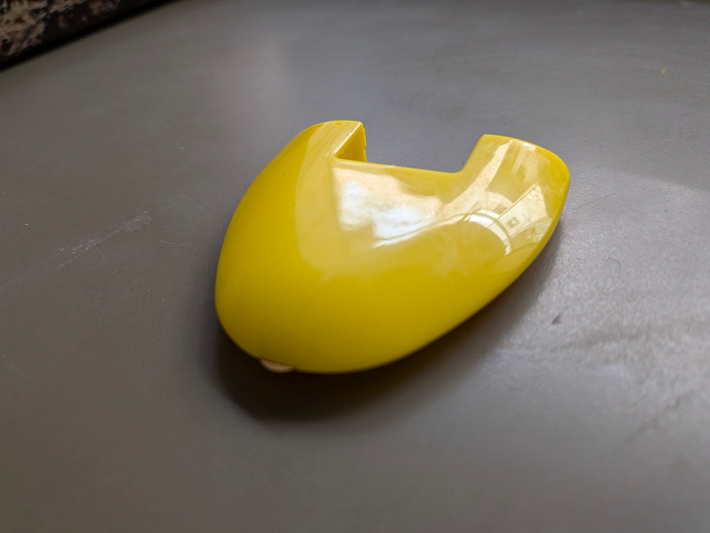 yellow wheel triangular chalk