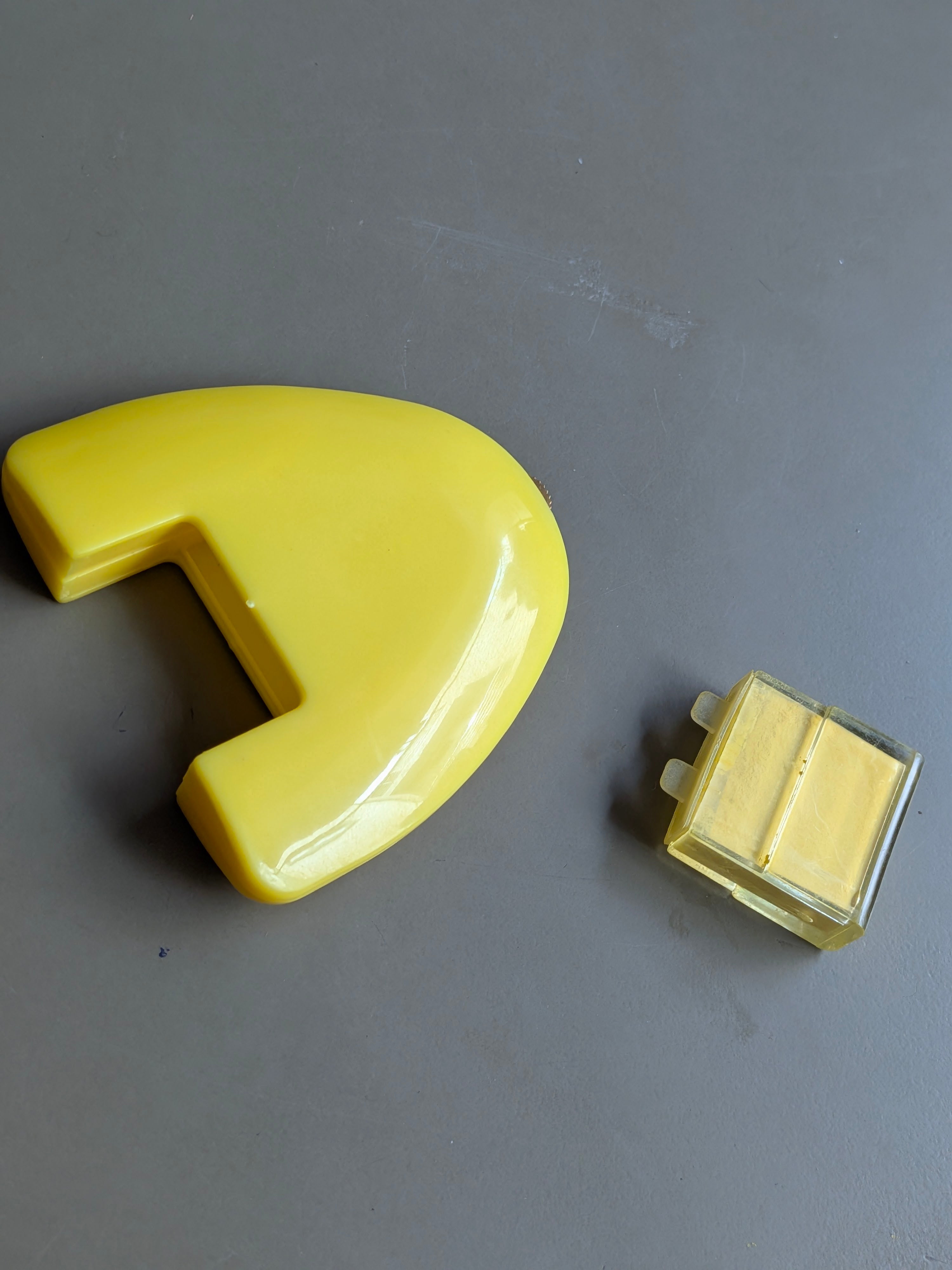 yellow wheel triangular chalk