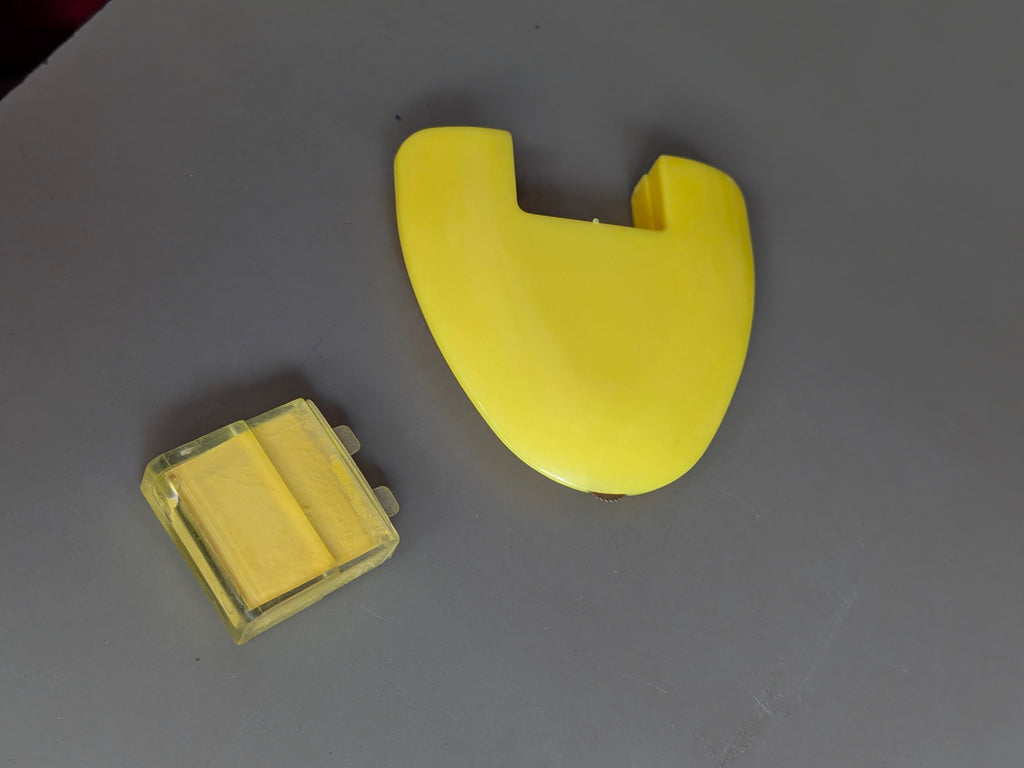 yellow wheel triangular chalk